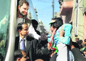 CATCHING EM YOUNG: Congress general secretary Rahul Gandhi in Hathras on Sunday