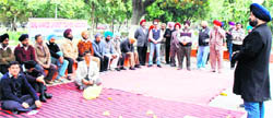 Teachers of GND University hold a rally on the campus in Amritsar 