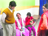 Inconsolable relatives of Aasha, who died of food poisoning in Mussoorie on Sunday.
