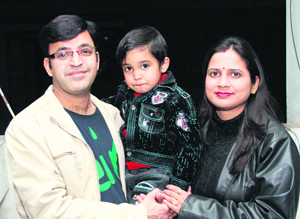 Vishawdeep Chaudhary and Ruchi Chaudhary with their son Anmol, whose birthday falls on February 29.