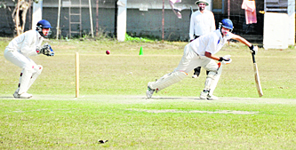 A player plays a shot during a match between Ludhiana and Bathinda at the PAU in Ludhiana on Sunday. Tribune photo: Himanshu Mahajan