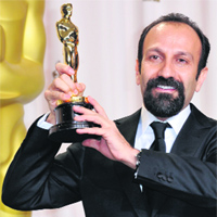 Asghar Farhadi, director of A Separation, poses with the trophy.