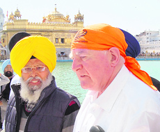 Keiran Mulhall, Mayor of Coventry city, UK, pays obeisance at the Golden Temple in Amritsar on Tuesday.  