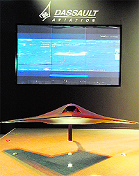 A model of Dassault Aviation's Neuron project European USAV technology demonstrator. The French aerospace giant, maker of the Falcon private jet and Rafale fighter plane, said Tuesday turnover in 2011 slumped 21% from the previous year, in line with forecasts