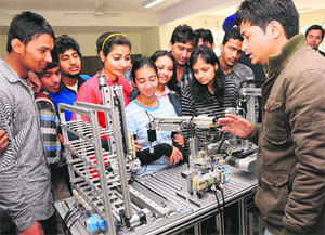 Students being apprised of a scientific instrument at the CSIO in Chandigarh on Tuesday.
