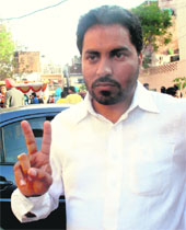 Makhan Singh, who bought the number. 