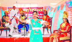 A girl gives a performance at a cultural festival organised by Sanskrit University in Haridwar