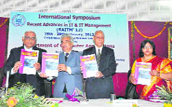 Dignitaries release a journal at an international symposium organised by Sri Guru Ram Rai Institute of Technology in Dehradun