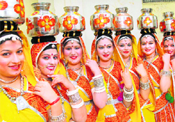 Students of the Apeejay College of Fine Arts get ready for a dance during the 37th annual prize distribution function in Jalandhar on Tuesday. 