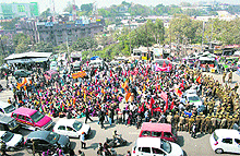 Trade union activists gather at Indira Chowk as part of a nationwide protest in Jammu on Tuesday.