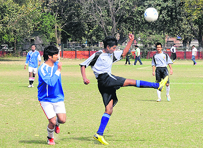 Players in action during a football match at the Football Stadium, Sector 42, Chandigarh, on Wednesday.