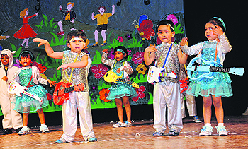Students of Woodlands House School, Panchkula, perform a dance during their annual function MUSIQUE-2012 at Tagore Theatre in Chandigarh on Wednesday. 