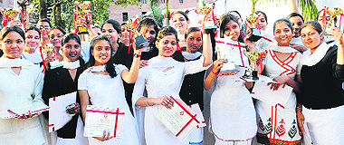 Students in a jubilant mood after winning awards at an annual prize distribution function of GCG-42, Chandigarh