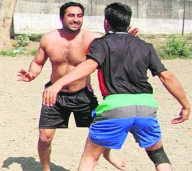 Inmates at a practice session for the Jail Olympics at the Central Jail in Amritsar on Thursday
