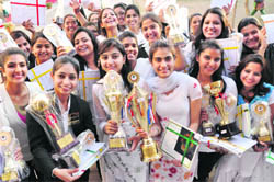 Students pose with their prizes at the annual prize distribution function of the Post Graduate Government College for Girls, Sector 11, Chandigarh