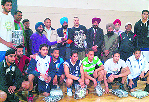 The Ludhiana Basketball Academy players with their trophy in Ludhiana on Thursday