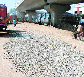 Construction work in progress on a road near Ghee Mandi in Amritsar on Friday.