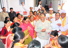 Chief Minister BC Khanduri celebrates Holi with his wife Aruna at his residence in Dehradun on Friday.