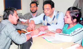Harpreet Kaur, Food Safety Officer, serves notice on a hookah bar.