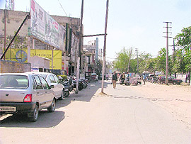 A view of shops constructed along the service lane on the Ferozepur Road in Ludhiana on Friday.