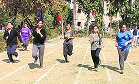 Students participate in a race during the annual athletics meet of the CMCH in Ludhiana on Friday.