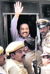 Former Karnataka minister G Janardhana Reddy waves to supporters in Bangalore on Friday. 