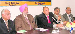 District Governor (in middle) addresses the press conference at Rotary Club in Ludhiana