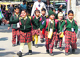 Children come out after school hours in Amritsar.