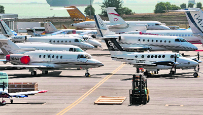 Private jets sit on the tarmac for the static display at the Singapore Airshow. As global demand for new airplanes continues to rise, Asian leasing firms, banks and capital markets are taking on a larger role in financing purchases amid a credit squeeze in Europe, industry executives and analysts say. 
