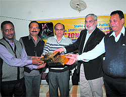 Senior officials of State Bank of Patiala handing over the prizes to the winners on the concluding day of the zonal sports meet held in Bathinda on Sunday