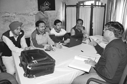 SDM Rajesh Tripathi holds a meeting at the Government College in Dera Bassi on Sunday.