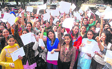 PU students in a jubilant mood after receiving prizes in the academic function at Panjab University in Chandigarh on Sunday.