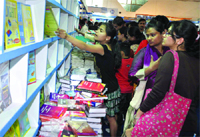 Visitors throng the book fair at Pragati Maidan in New Delhi on the last day of the event on Sunday.