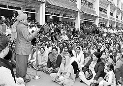 Chief Minister PK Dhumal addresses a gathering at Nagrota Bagwan in Kangra subdivision on Sunday