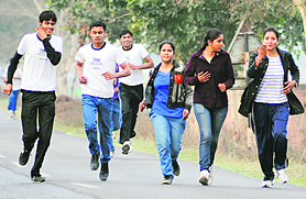 Residents participate in the CT Half Marathon in Jalandhar on Sunday.