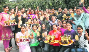 Winners after receiving awards during the annual prize distribution function of Kanya Maha Vidyalaya (KMV). Tribune photo: Malkiat Singh