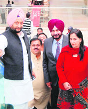 MP Navjot Singh Sidhu with wife Navjot Kaur at a mall in Amritsar on Monday. 