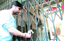 Shushant Bhatia seals Amrit Talkies Cinema Hall in Amritsar on Monday.
