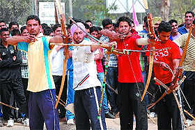 Students of Government Rajindra College in Bathinda take part in the archery contest on Monday.