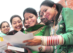 Students in a jubilant mood after receiving certificates and trophies in the 28th annual prize-distribution function at Government College, Phase VI, Mohali.