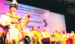 A delegate performs during an international conference in Haridwar
