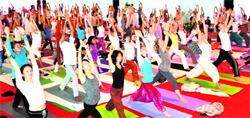 Foreign yoga practitioners and delegates at the morning session of the ongoing Internatioanl Yoga Festival in Rishkesh 