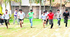 Students participate in a race during the annual athletics meet at Prabhu Dayal Polytechnic College in Barna. 