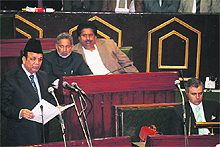 Finance Minister Abdul Rahim Rather presents the budget in the Assembly on Monday. 
