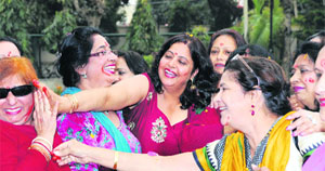 Celebrating Holi Members of the Gymkhana Club apply gulal on each others faces in Jalandhar on Monday.