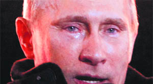 A teary-eyed Vladimir Putin addresses supporters during a rally near the Kremlin. 