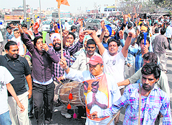 Supporters celebrate SAD candidate NK Sharmas victory at Dera Bassi on Tuesday.