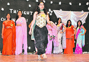A girl walks the ramp during a farewell party at the Home Science College in Sector 10 of Chandigarh on Tuesday.