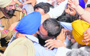 SAD activists celebrate the victory of party candidate Manpreet Singh Ayali.