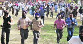 Ecstatic supporters of Bains jump with joy after he was declared winner.